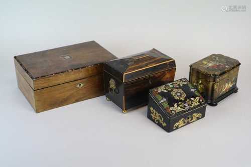 A small 19th century coromandel veneered sarcophagus shaped tea caddy, with hinged cover and