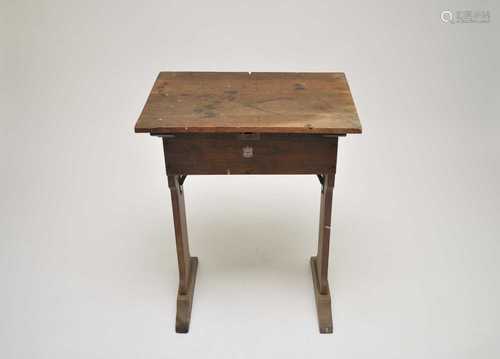 A small late Victorian oak lectern/desk, with a hinged top and shaped sides, 75cm high, 61 x 42cm.