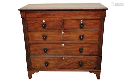 A large 19th century mahogany chest of two short and three long drawers, with an over-hanging top