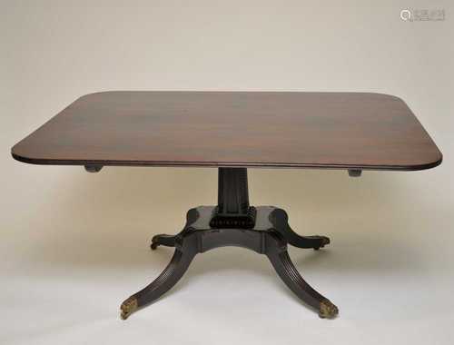 A large 19th century mahogany breakfast table, with a tablet top with fluted borders, over a moulded