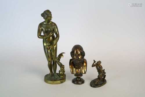 A cast brass study of Venus,the figure acompanies by a cherub astride a dolphin, after the