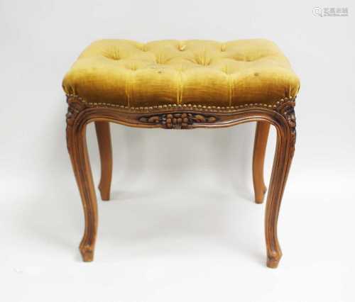 A French upholstered piano stool, with carved foliate borders, 48cm high, 40 x 50cm.