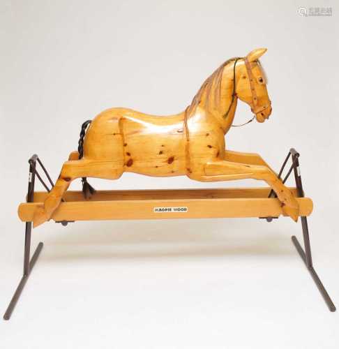 A good quality mid-late 20th century rocking horse, with horsehair mane and tail and glass eyes,