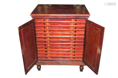 A Victorian mahogany collector's or specimen cabinet, with hinged panelled doors opening to reveal