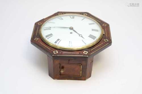 A 19th century fusee wall clock, the painted dial with Roman numerals, set in an octagonal case with
