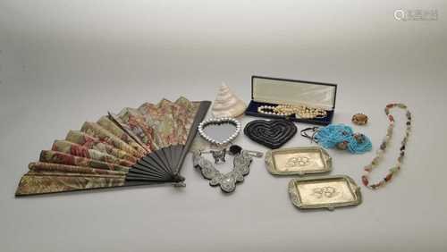 A collection of various pieces of costume jewellery