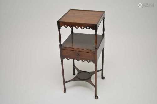 A small George III mahogany two-tier wash stand of small proportions