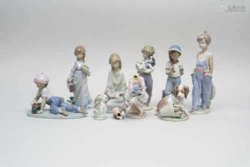 Nine Lladro porcelain figures late 20th century including a boy with a baseball bat, a boy with a