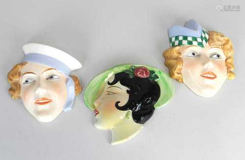 Three Art Deco wall masks