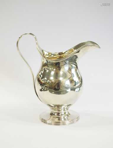 A George III pedestal silver cream jug