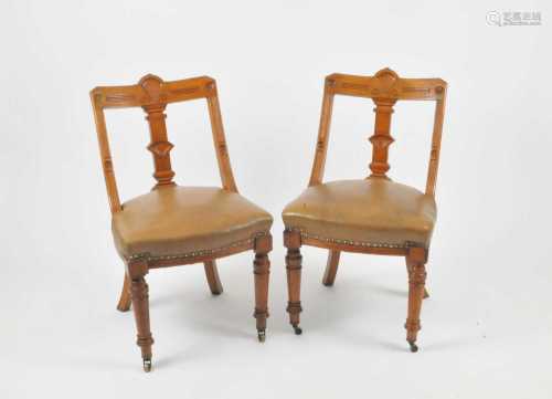 A set of eight late 19th / early 20th century oak framed dining chairs, Aesthetics style, with