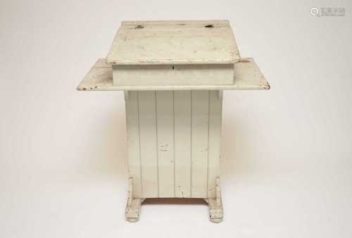 An early 20th century painted pine clerk's desk, with a hinged top over a vacant interior, 106cm