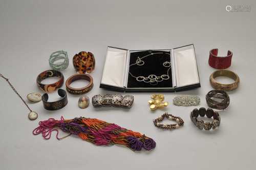 A collection of various pieces of costume jewellery