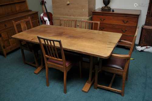 Alan Grainger (Acornman) a pale oak refectory dining table, the adzed top raised on swept pegged