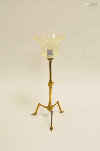 A W.A.S Benson style brass table/wall lamp, on adjusting angular tripod foot, with a flared ribbed