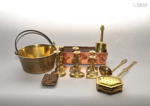 A collection of 19th century and later metal wares to include a large brass jam pan with iron loop