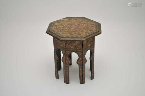 An early 20th century Kashmiri painted lacquer occasional table, in the Moorish taste, with a