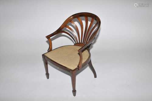 An Edwardian rosewood elbow chair, wih fan-shaped back, inlaid detail and fixed upholstered seat,