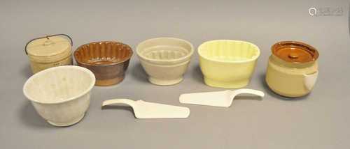 A collection of jelly moulds and ceramic kitchenalia