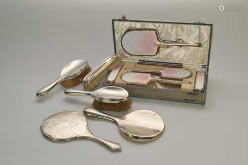 A cased silver and guilloche enamel dressing table set