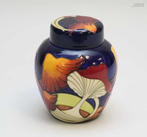 A Moorcroft ginger and jar and cover early 21st century tubelined with orange and red mushrooms