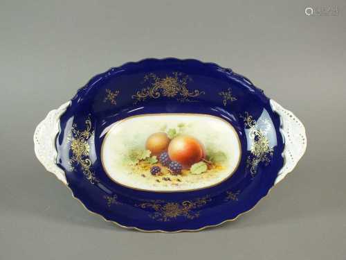 A Coalport oval dish painted with fruit by F. Howard.