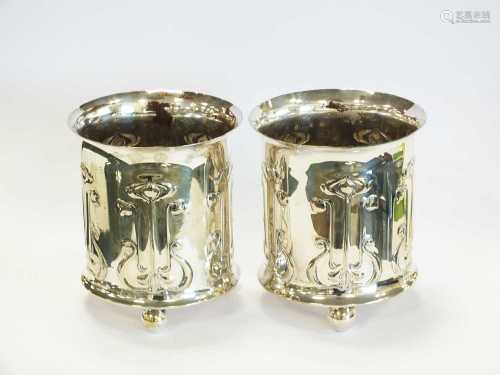 A pair of Art Nouveau silver plated planters/vases