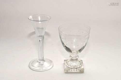 A reproduction 18th century wine glass and a 19th century George III rummer