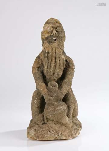 Medieval Limestone Drinking Man, English, circa 1400 - 1450. The Oolitic limestone figure of a