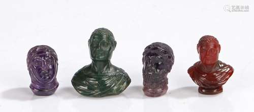 Four hardstone carved miniature busts, 19th Century, each carved in the Roman style with an amethyst