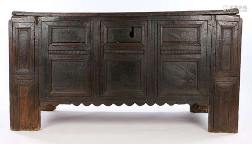 16th Century oak Flemish coffer, of large proportions, the panel top with moulded edge above the