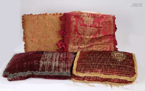 Collection of cushions, to include an 18th Century red velvet fitted seat cushion with a silver