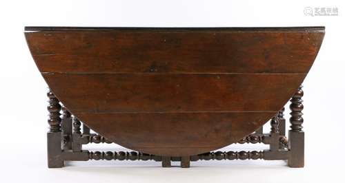 Very Large Charles II oak double gateleg table, English circa 1660 – 1670. the oval plank top