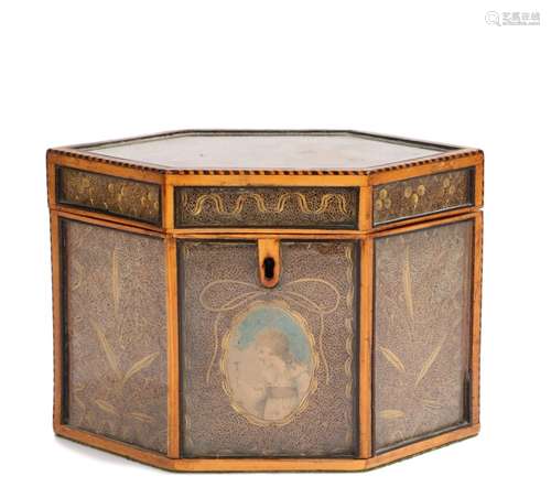 George III satinwood and scrollwork tea caddy, late 18th Century, with glazed panels decorated