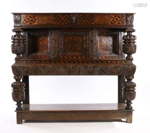 Late Elizabethan/James I oak & inlaid canted cupboard, English, Sussex, circa 1600 – 1610. the plank