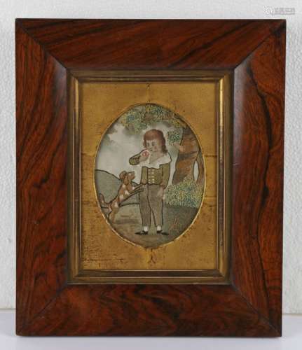 Early 19th Century silk work, boy and dog playing with a ball, housed within a rosewood frame,