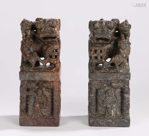 Large pair of Chinese seals, Qing dynasty, with dogs of foo above figural bases and seal marks to