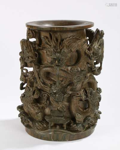 Chinese hardwood brush pot, of large proportions, the deeply carved green hardwood body with dragons