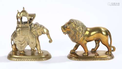 Indian brass elephant, with a carriage on the elephants back, 13cm long, together with a lion,