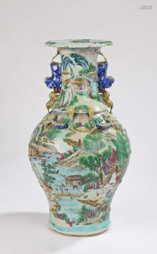 Chinese Canton porcelain vase, Qing Dynasty, decorated with figural and pagoda scenes flanked by