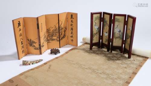 Chinese works of art, to include a silk scroll, a stand, a finger nail protector brooch and two