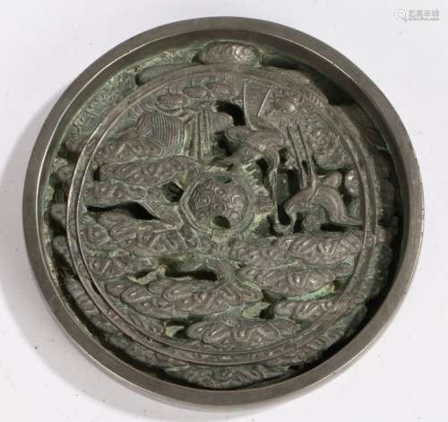 Japanese Edo period bronze mirror, the silvered mirror with raised branches and storks, 12cm