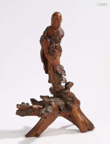 Chinese root wood carving, Qing Dynasty, the a figure standing above the root base, 36cm high