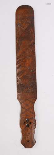 Large Japanese page turner, Meiji period, carved with an eagle hunting a rabbit, 46cm long