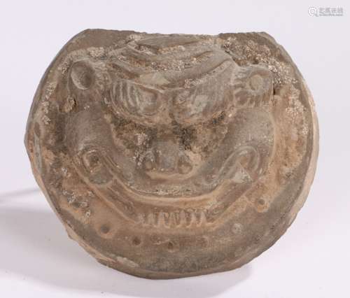 Chinese pottery mask plaque, with a dog of Foo head to the plaque back, 11cm wideExcavation earth