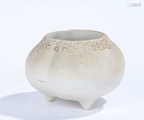 Chinese porcelain censer, the cream body with three bulbous sides and arched lappet edge, raised