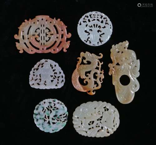 Collection of Chinese Jade and hardstone, to include an example with a bird and flower surround,
