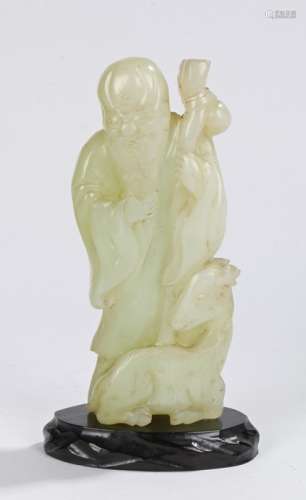 Chinese jade carving, Qing dynasty, of large proportions, of a bearded scholar above a reclining