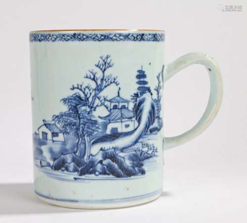 Chinese porcelain tankard, Qing Dynasty, with pagodas n a rocky landscape, 14cm high