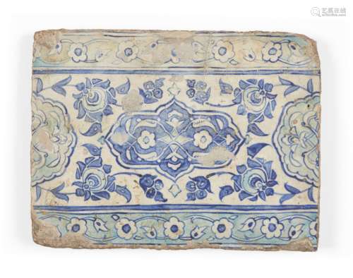 A Damascus Iznik tile, Syria, circa 1530, of rectangular form, underglaze painted in cobalt and